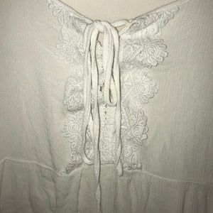 White long sleeve with flowy sleeves